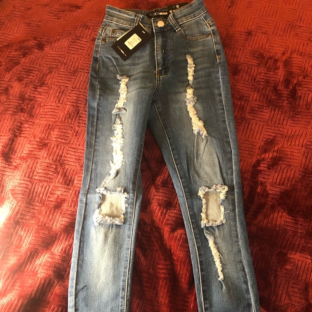 FashionNova Blue ripped jeans